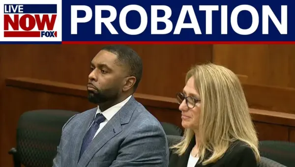 Ex-Michigan Coach Moore Gets Probation in Case Dismissed