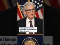 Fed Holds Rates Steady Amidst Oil Price Surge and Tariff Uncertainty