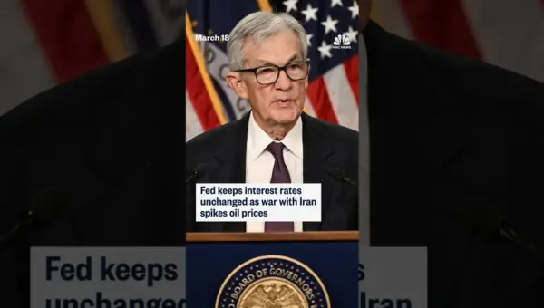 Fed Holds Rates Steady Amidst Oil Price Surge and Tariff Uncertainty