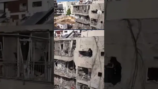 Iran Missiles Strike Israel, Damaging Buildings