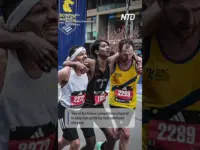 Marathon Finishers Show True Spirit Helping Collapsed Runner