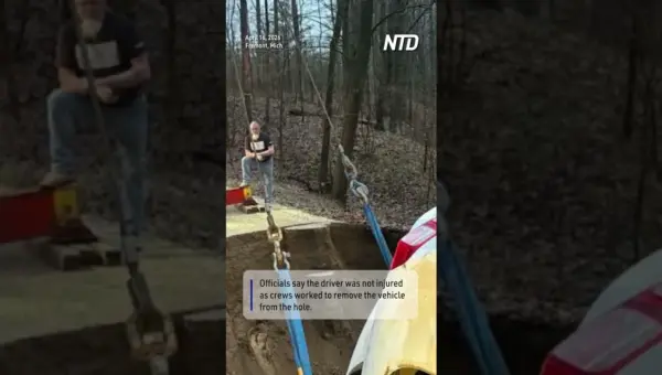 Michigan Floods Open Chasms, Swallowing Cars Whole