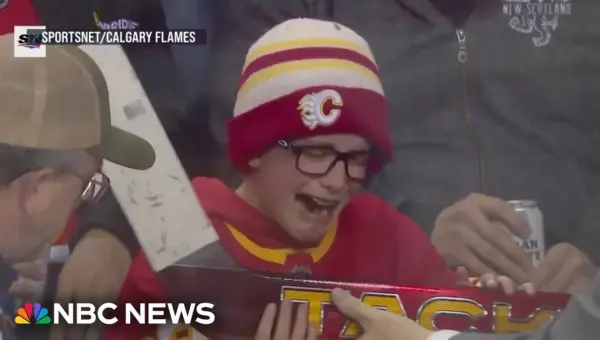 NHL Star Gifts Stick to Crying Young Fan