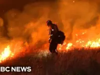 Springs Fire Threatens Homes: Evacuations Underway