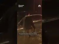 Tornadoes Rip Midwest; Floods Force Evacuations