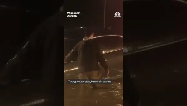 Tornadoes Rip Midwest; Floods Force Evacuations