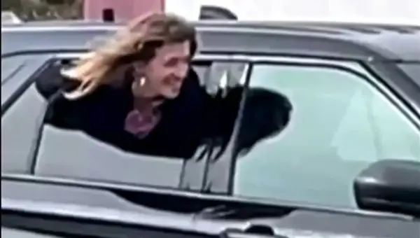 Woman Escapes Police Car in Viral Houdini-Like Stunt